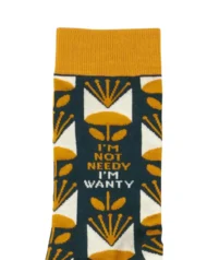 Treat your feet to a pair of "I'm Not Needy" socks! These quirky socks are not only comfortable, but also feature funny sayings that will keep you smiling. So forget being needy, embrace your "wanty" side with these playful socks.
