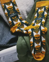 Treat your feet to a pair of "I'm Not Needy" socks! These quirky socks are not only comfortable, but also feature funny sayings that will keep you smiling. So forget being needy, embrace your "wanty" side with these playful socks.