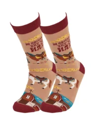This pair of colorful socks displays a unique hand illustrated designs of various horses with saddles with a fun sentiment that reads "I'd Rather Be At The Barn." Socks feature a one size fits most design made with cotton, nylon, and spandex. A fun western-themed gift perfect for everyday self-expression.